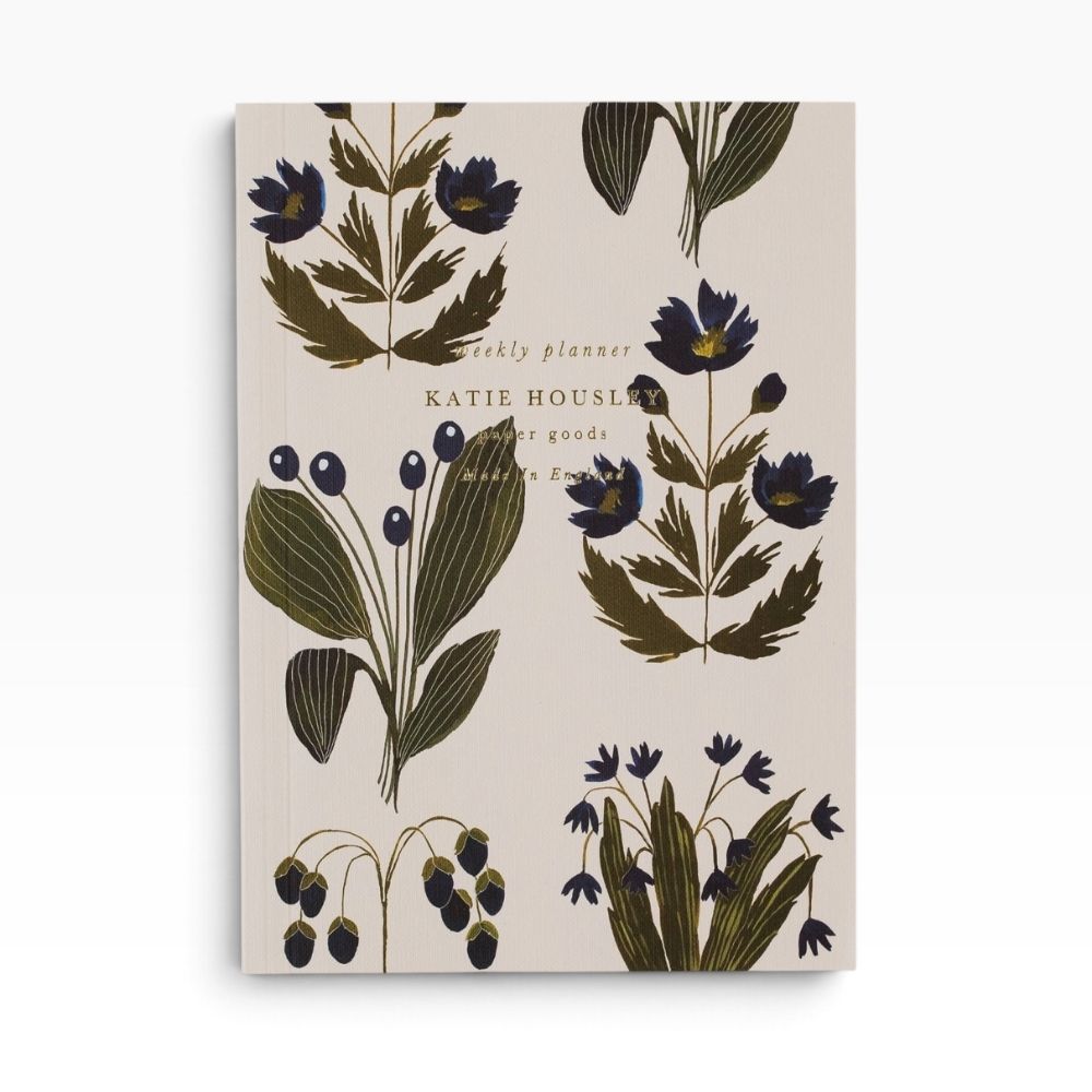 Katie Housley Blue Botanical A5 weekly planner with an embossed cover and gold foil detailing